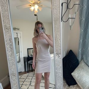 A tan cocktail dress size medium from the brand Lush.